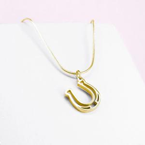 pt-pe-04-hw-gp-00-xx-hufeisenanhanger-frau-ponytail-co-gold-tu
